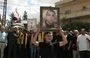 
Mourners attend the funeral of a Hizbullah element in the town of Chaat in Lebanon's Bekaa valley on September 21. [AFP]        