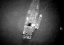 
Aerial photographs purportedly show a rendezvous between a large Russian ship and smaller Houthi boats, which then ferried crates to shore. [US Government]        