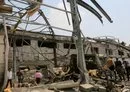 
People check the destruction at an al-Hodeidah city power station on September 30, a day after it was targeted in retaliatory Israeli strikes. [AFP]        