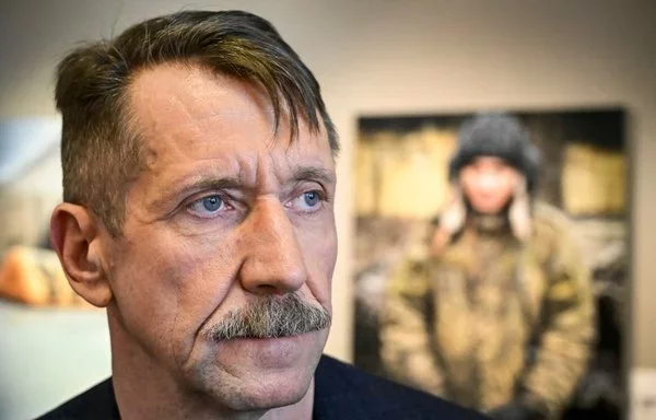 Viktor Bout poses during the opening of an art exhibition in Moscow on March 7, 2023. [Alexander Nemenov/AFP]