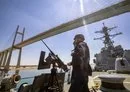 
Gunner's mates stand watch aboard the USS Carney while transiting the Suez Canal on April 6. [US Navy]        