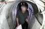 
Hamas leader Yahya Sinwar heads to hide in a tunnel before launching the terrorist attack on Israel on October 7, 2023, in this screenshot from a video by posted by the IDF on October 19, 2024.        