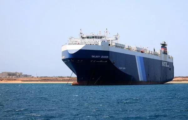 The cargo vessel Galaxy Leader, seized by Houthi fighters on November 19, 2023, is seen at anchor off the coast of Yemen's al-Hodeidah port on May 12. [AFP]