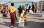 
African migrants gather at a makeshift camp to receive humanitarian aid in al-Hodeidah province's Khokha district on November 25, 2023.        