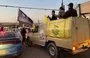 
Fighters from Iran-aligned Iraqi militia Harakat al-Nujaba, which has taken part in regional attacks, are seen riding in a truck in a photo circulated on X on June 3.        