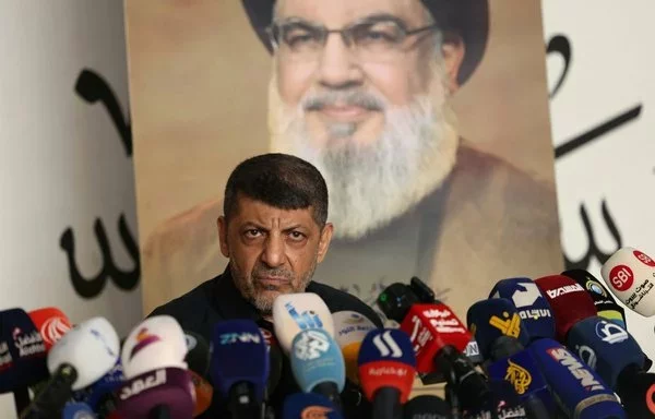 Hizbullah spokesman Mohammed Afif speaks at a news conference. He died November 17. [Anwar Amro/AFP]