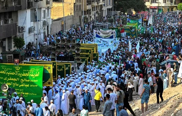 A gathering in Cairo's Al-Azhar district celebrates the Prophet Mohammed's birth on September 15. [Khaled Desouki/AFP]