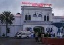 
An ambulance stands at the Mogadishu Municipality Headquarters where al-Shabaab killed at least six people on January 22, 2023. [Hassan Ali Elmi/AFP]        