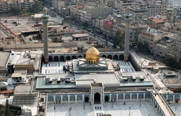 Aerial view of the Sayyida Zainab shrine on the outskirts of Damascus. [Bakr Alkasem/AFP]