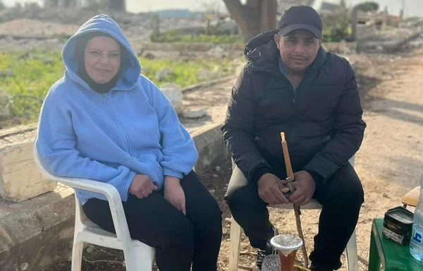 After an absence of more than a year, Dhayra residents spend the day in their home village, which was heavily damaged during Hizbullah's war with Israel. [Jnoub Sweid/Al-Fassel]