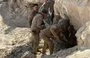 
Iraqi forces inspect an ISIS hideout destroyed by an airstrike near Rawa in western Iraq on February 13. [Joint Operations Command]        