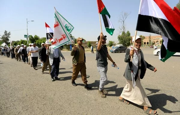 In Houthi-controlled Sanaa, Yemenis march in support of Gaza on June 10, 2024. The Houthis have been accused of exploiting Palestinian suffering for their own gain. [Mohammed Huwais/AFP]