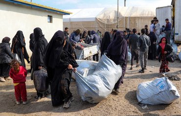 Families leave Syria camps for new lives as reintegration efforts pick up pace
