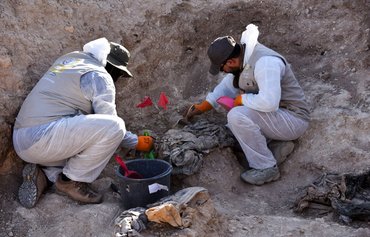 Iraq begins excavation of mass grave tied to extremist terror