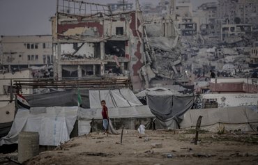 Gaza residents unanimously back first phase of peace plan