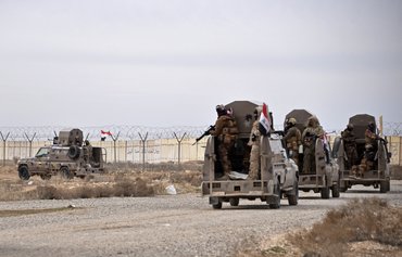 Sinjar Resistance hands over weapons to build unified Iraq